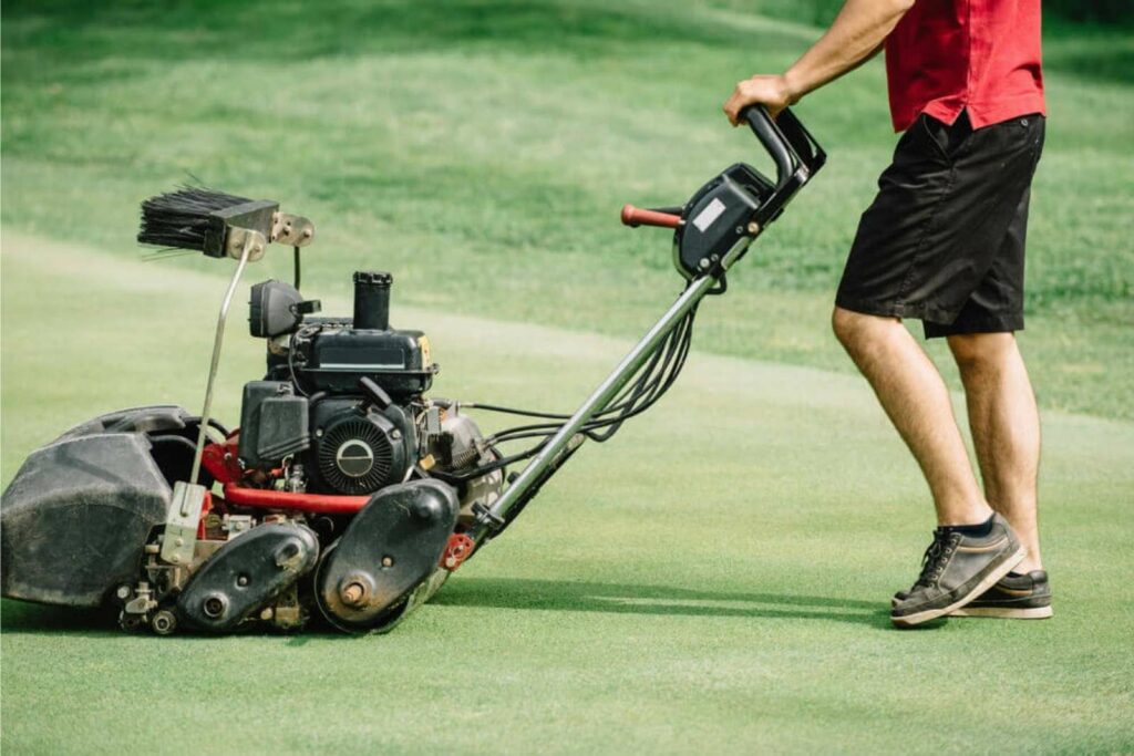 Hand-operated mowers are often used for more precise cutting of the greens